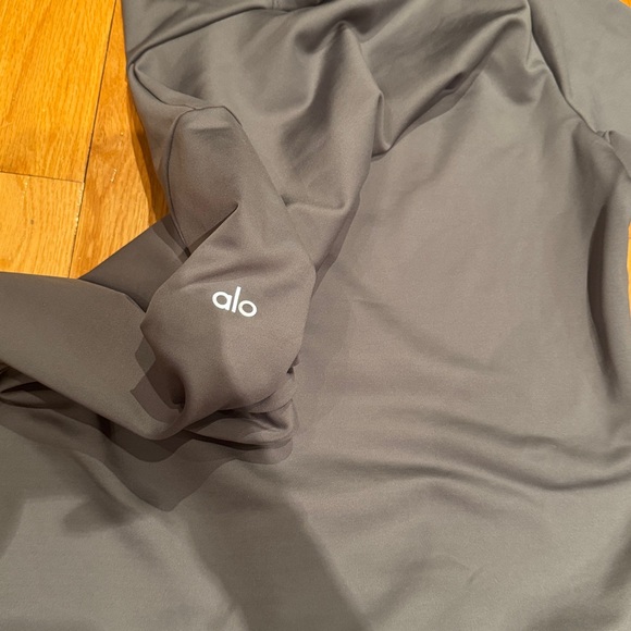 Alo Yoga Airlift Warm Hooded Runner in gray with a brushed interior for warmth. - Picture 6 of 6
